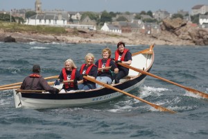 Rowing boat with crew of four